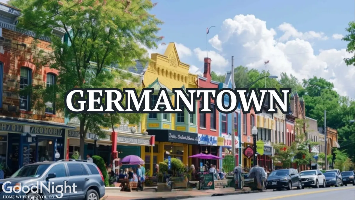 A lively street scene with colorful storefronts, people dining outdoors, and leafy trees overhead. The bustling vibe captures the energetic, social side of Nashville’s urban dining and gathering culture.